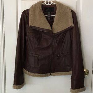Moda International lamb leather with faux shearling trim bomber jacket.